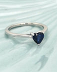 Exquisite Heart Shape Blue Sapphire Ring, Designed In 18k White Gold. A Luxurious And Unique Piece Of Jewelry, Perfect For Adding A Chic Touch Of Style And Elegance. Its Striking Blue Sapphire Can Be Worn As Is For A Subtle Yet Glamorous Look, Or Layered With Other Favorite Pieces For A Pop Of Vibrant Color. Indulge Yourself Today!