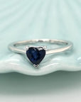 Exquisite Heart Shape Blue Sapphire Ring, Designed In 18k White Gold. A Luxurious And Unique Piece Of Jewelry, Perfect For Adding A Chic Touch Of Style And Elegance. Its Striking Blue Sapphire Can Be Worn As Is For A Subtle Yet Glamorous Look, Or Layered With Other Favorite Pieces For A Pop Of Vibrant Color. Indulge Yourself Today!