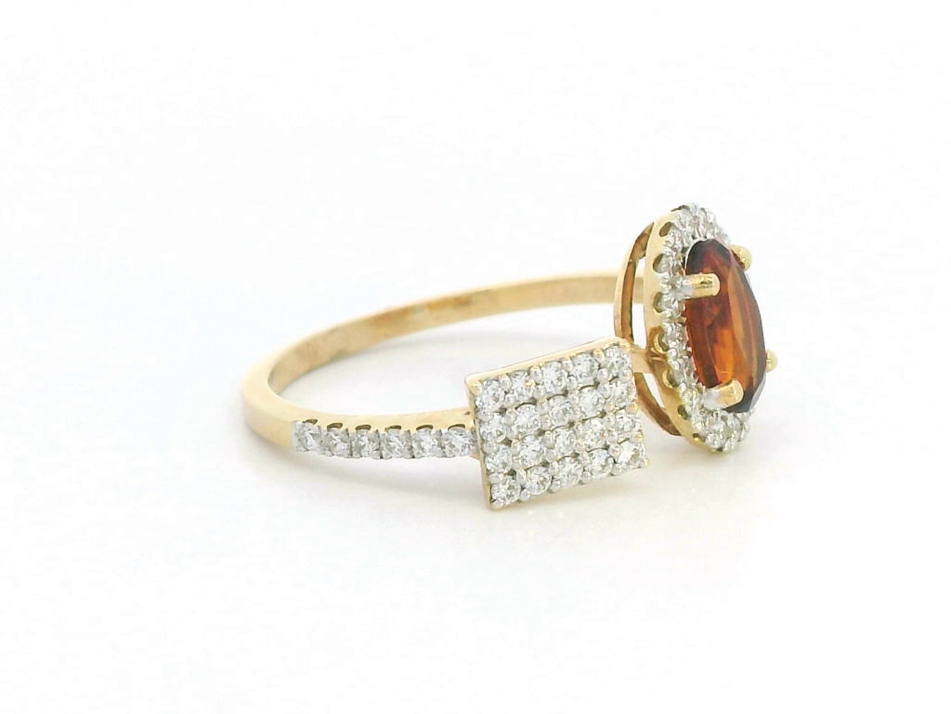 18K gold asymmetrical cocktail ring with oval citrine and diamond pavé detailing