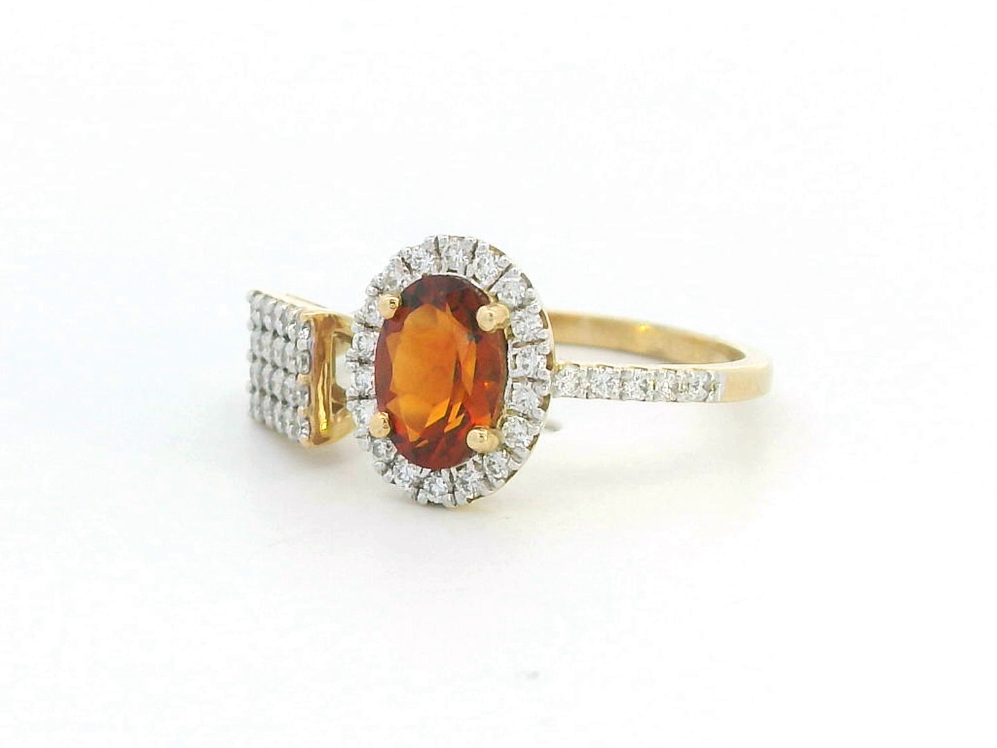 18K gold asymmetrical cocktail ring with oval citrine and diamond pavé detailing