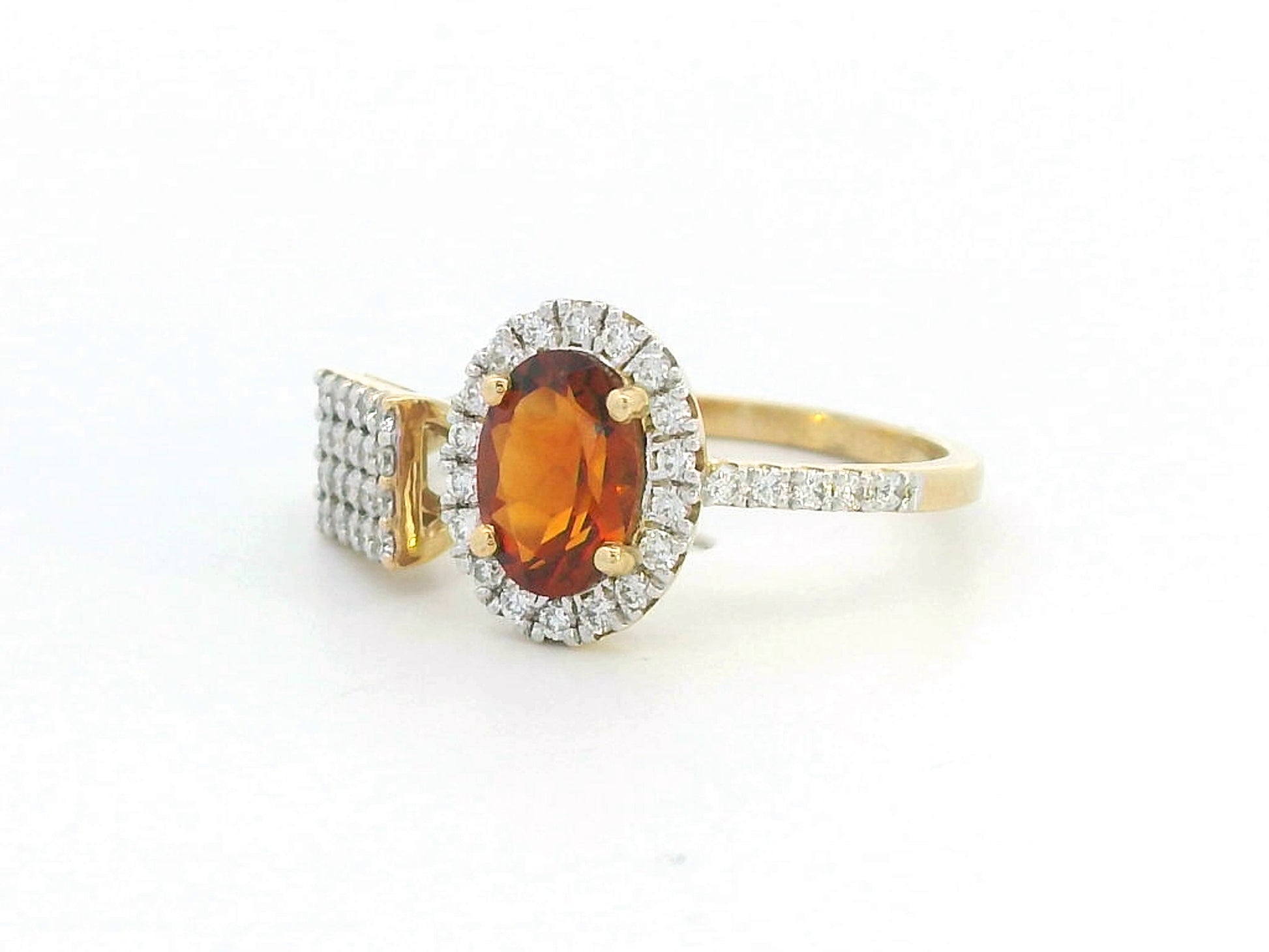 18K gold asymmetrical cocktail ring with oval citrine and diamond pavé detailing