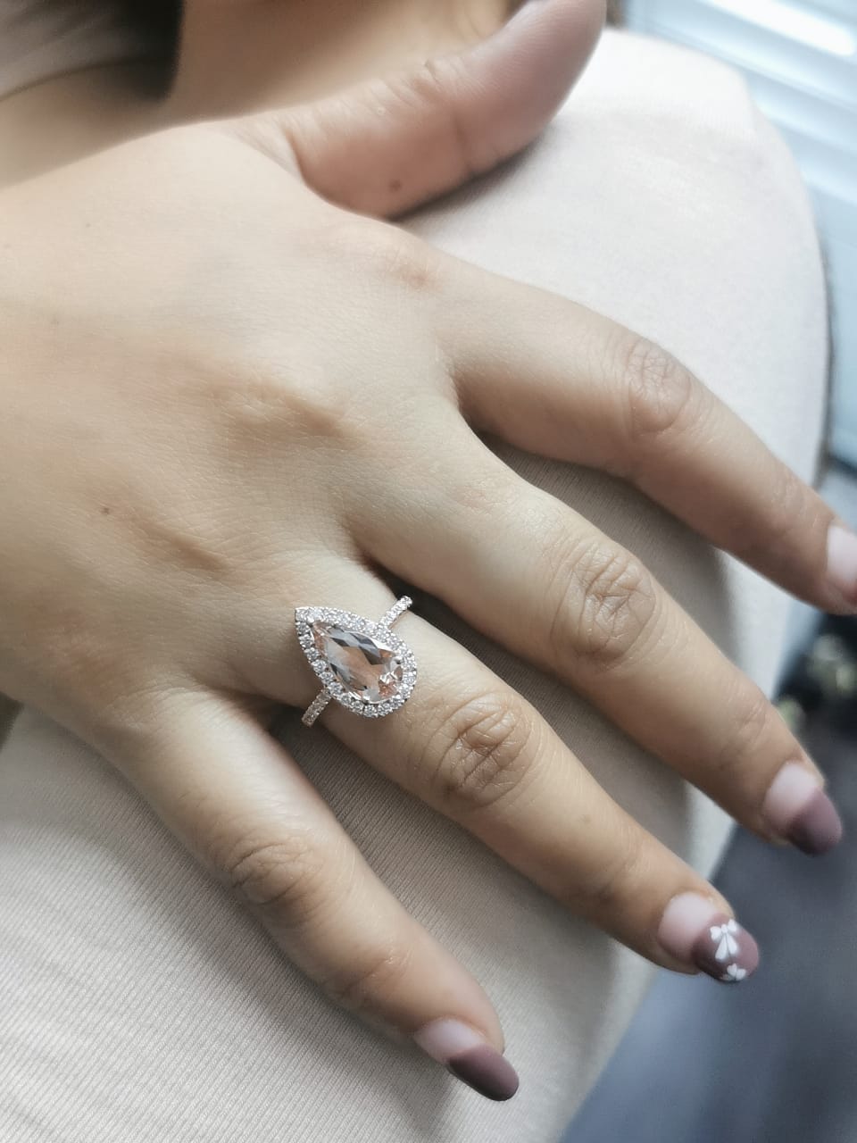 1.91 ct pear-cut morganite and diamond halo ring in 18K rose gold with pave-set diamond band – Emirates Diamonds