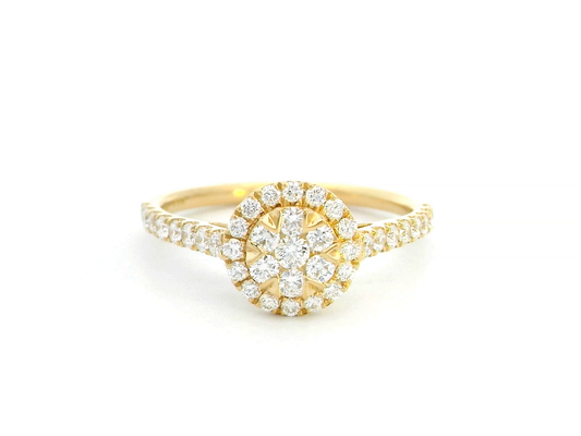 Luxury 18K yellow gold diamond cluster ring, featuring 0.61 carats of round-cut diamonds in a floral-inspired vintage design.