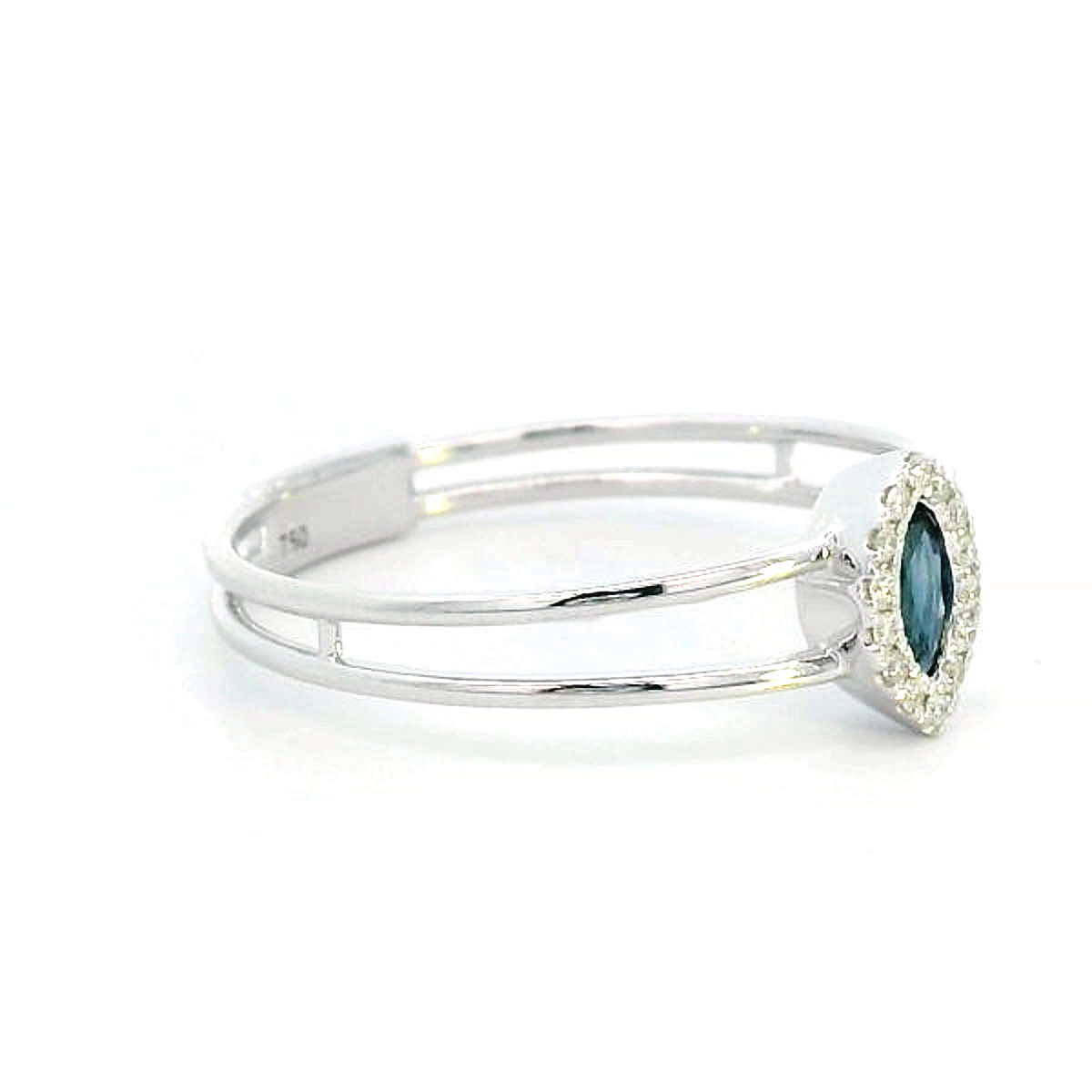 18K gold marquise-cut blue sapphire and diamond halo ring featuring a 0.16-carat blue sapphire, framed by 0.05 carats of diamonds, set in an elegant double-band design.
