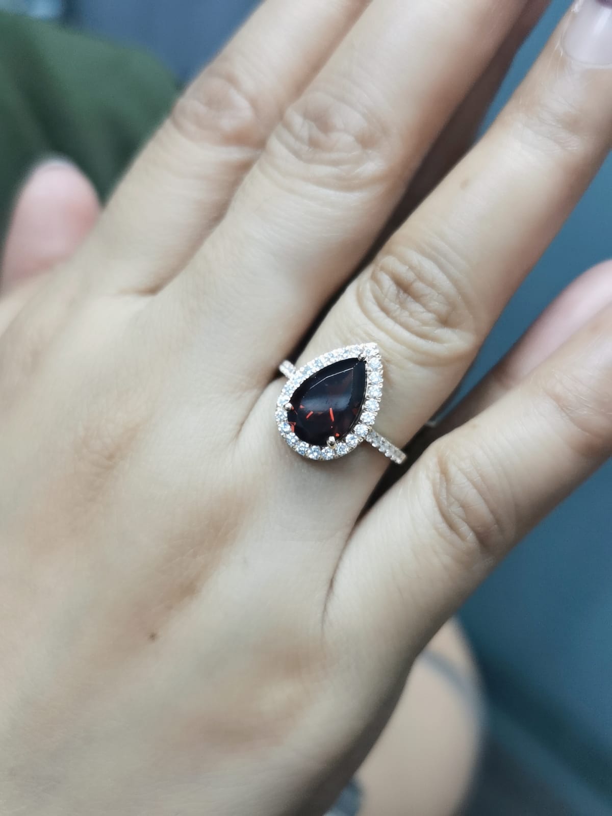 Elegant 18K Gold Pear-Shaped Garnet and Diamond Halo Ring