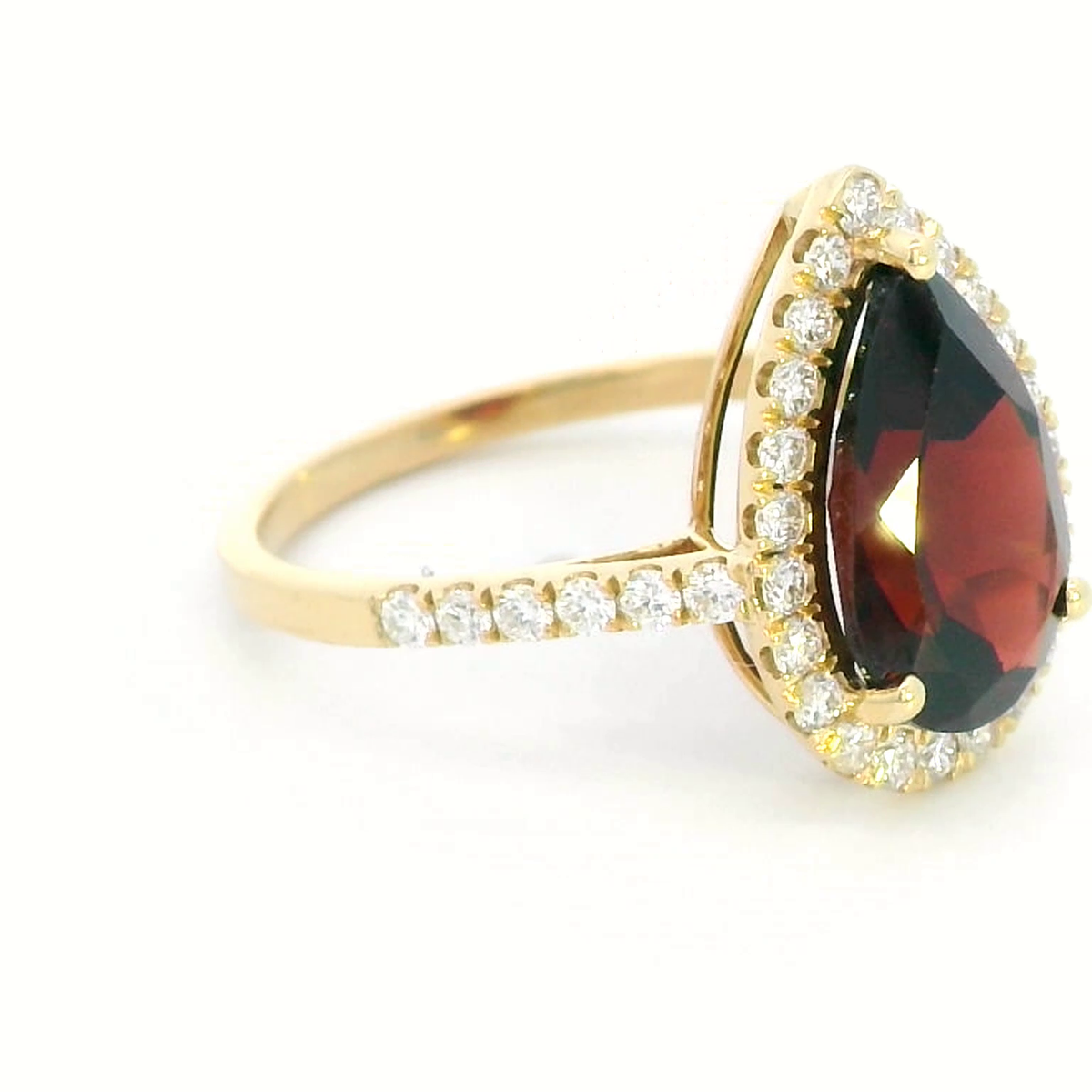 Elegant 18K Gold Pear-Shaped Garnet and Diamond Halo Ring
