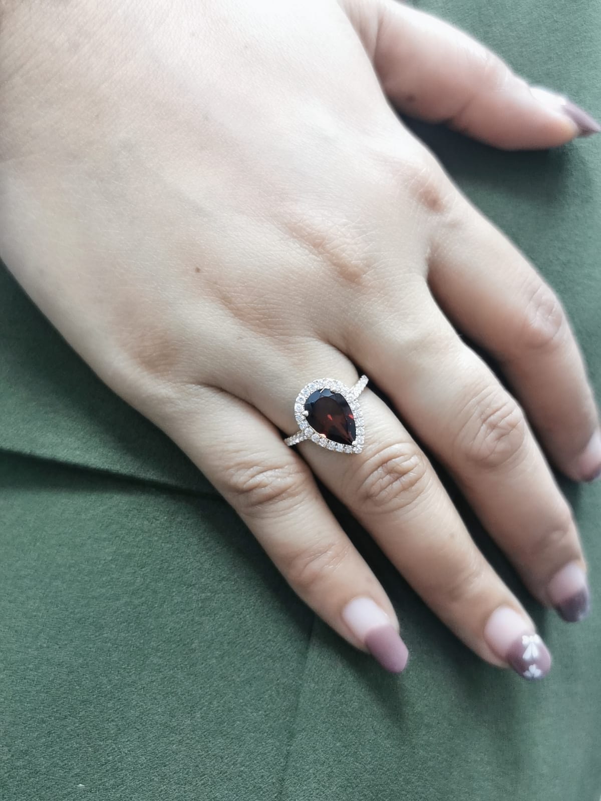 Elegant 18K Gold Pear-Shaped Garnet and Diamond Halo Ring