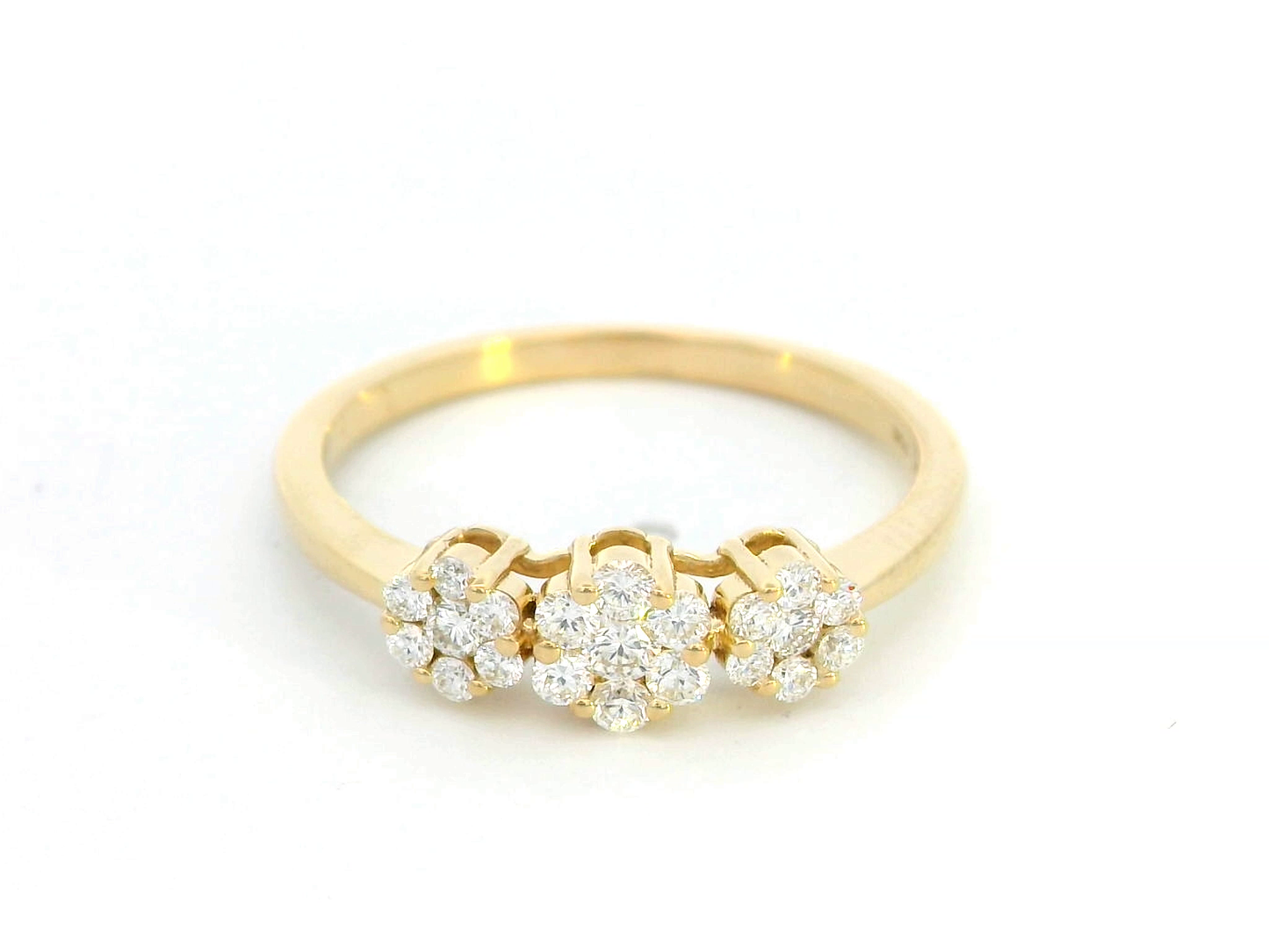 18k gold triple cluster diamond ring featuring 0.37 carat diamonds in a floral design.