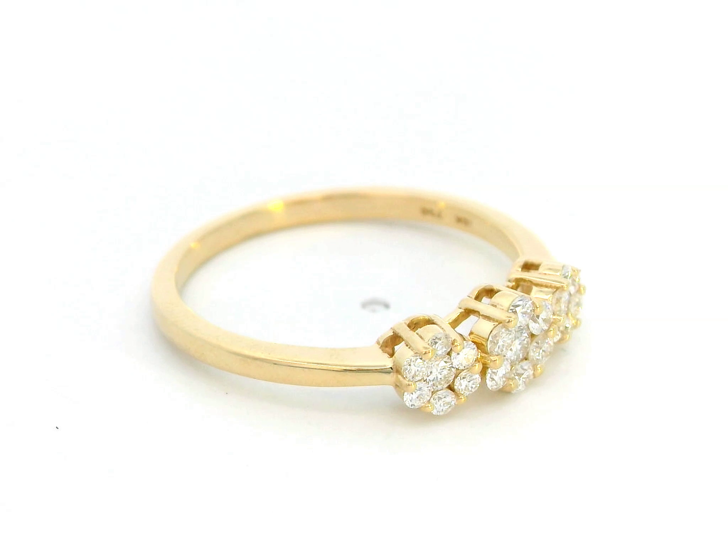 18k gold triple cluster diamond ring featuring 0.37 carat diamonds in a floral design.