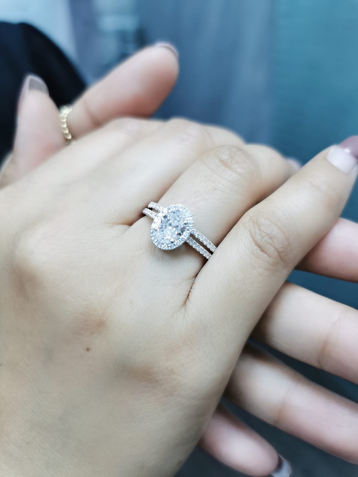 1.03 Carat Oval Diamond Halo Engagement Ring in 18K Gold