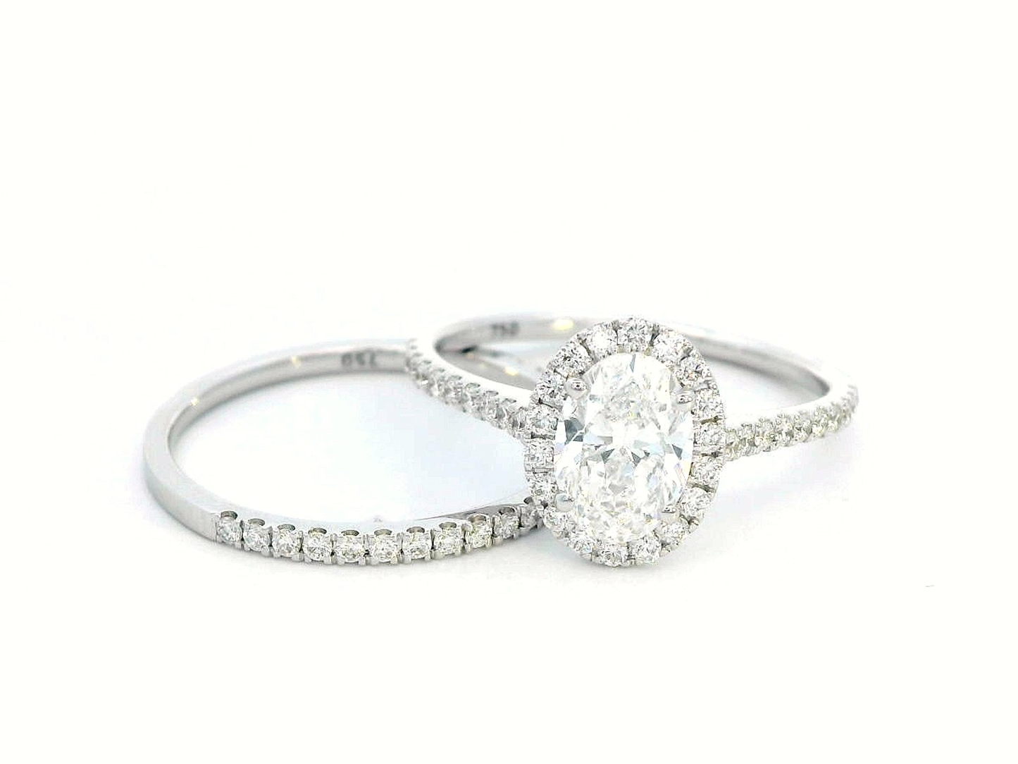 1.03 Carat Oval Diamond Halo Engagement Ring in 18K Gold
