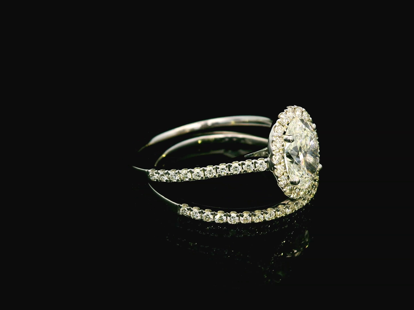 1.03 Carat Oval Diamond Halo Engagement Ring in 18K Gold