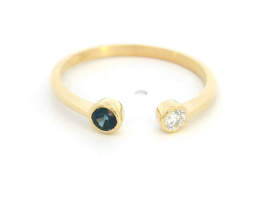 18K gold open ring with bezel-set round sapphire and diamond in minimalist  design