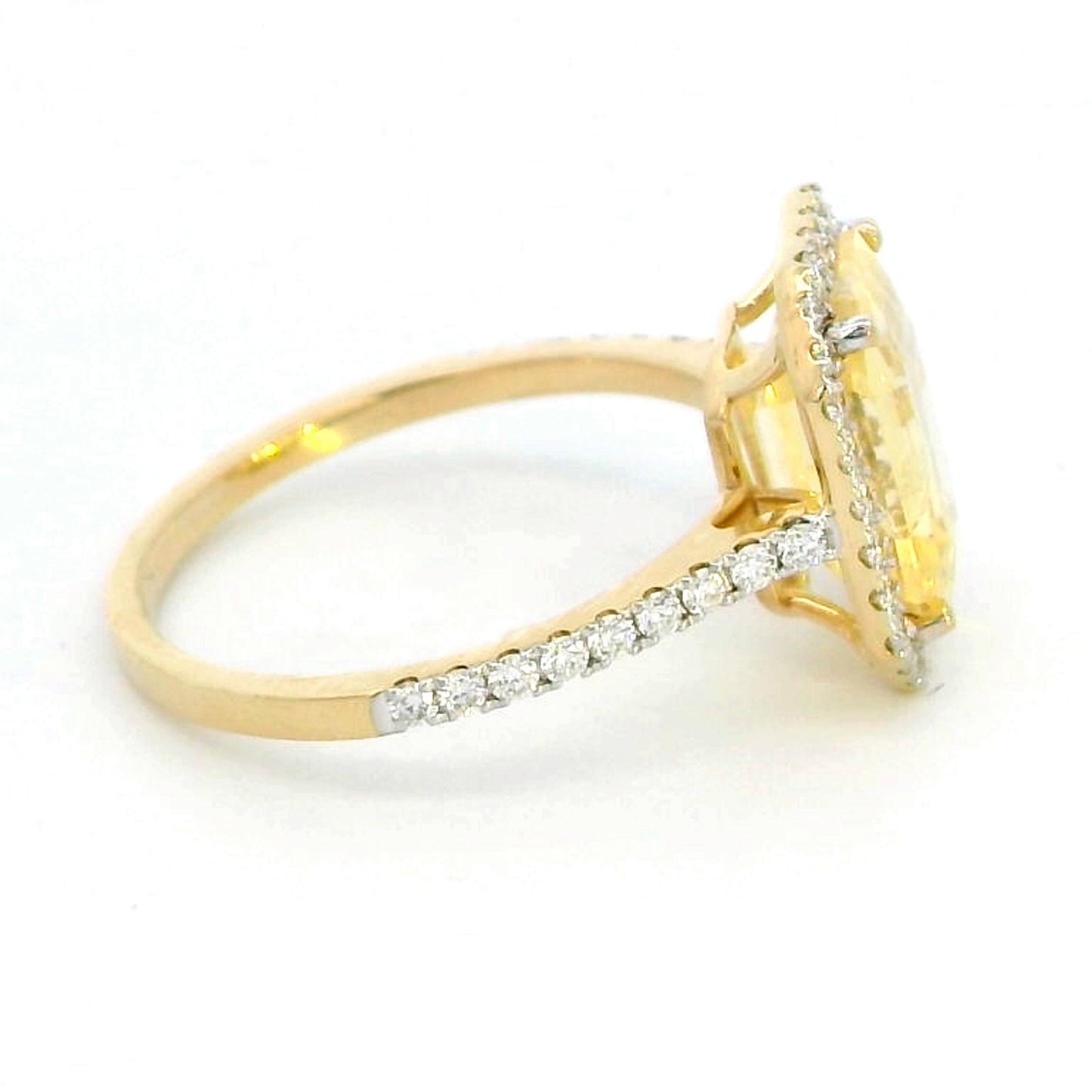 Exquisite 18K Yellow Gold Ring with 4.99 Carat Yellow Sapphire & Diamond Halo