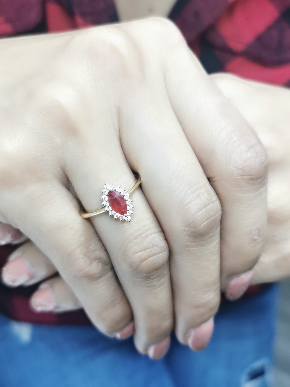 18K yellow gold marquise ruby ring with diamond halo"