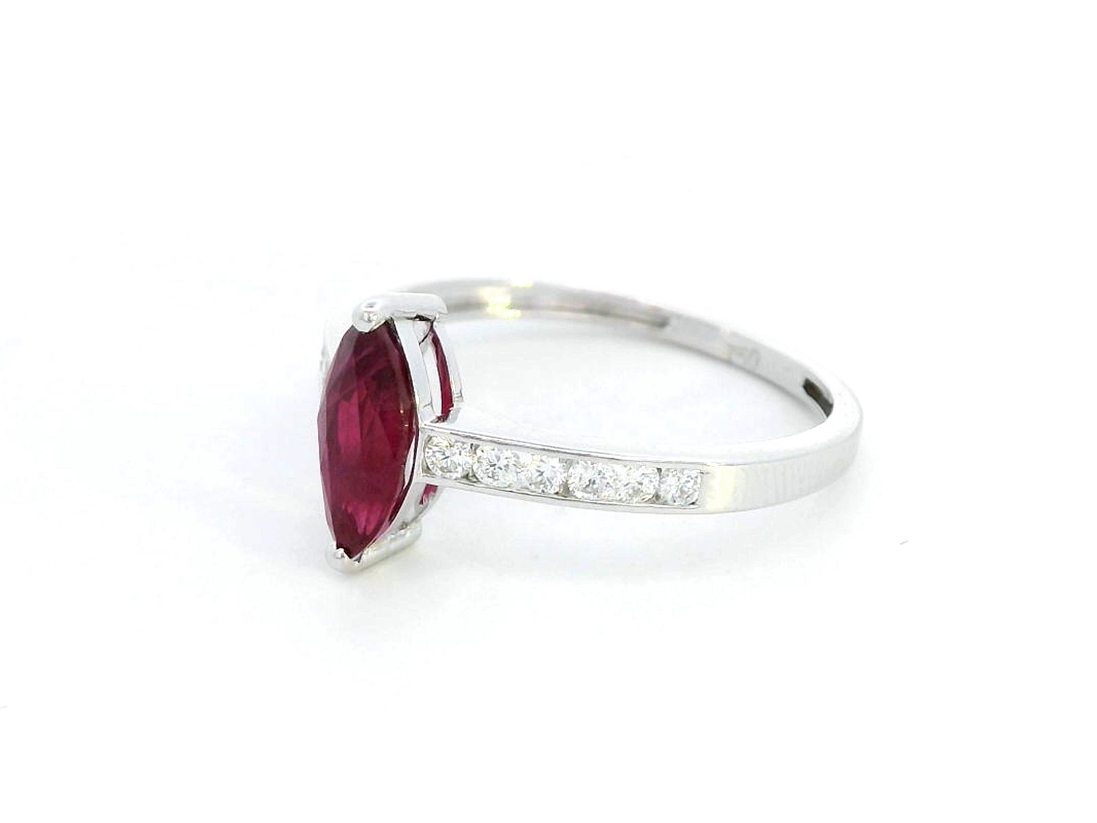 18K white gold marquise ruby and diamond ring featuring a 0.97-carat ruby and 0.21 carats of diamonds, symbolizing the July birthstone.