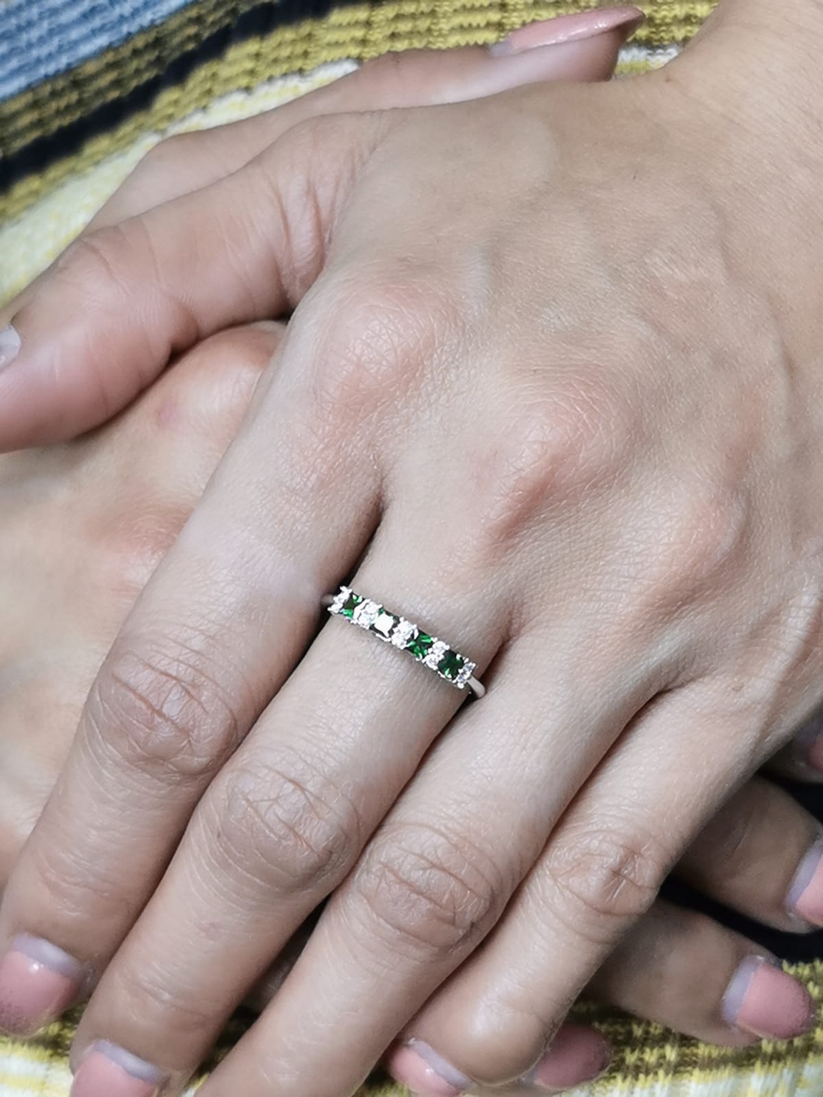 Princess-cut tsavorite and diamond ring in 18K white gold, elegant January birthstone jewelry.