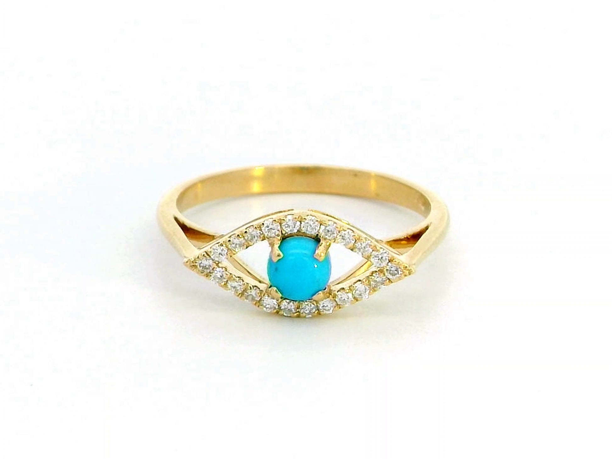 18K gold Evil Eye ring featuring a 0.32-carat turquoise center stone with a 0.15-carat diamond halo. Symbolic and stylish, perfect for stacking.