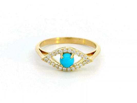18K gold Evil Eye ring featuring a 0.32-carat turquoise center stone with a 0.15-carat diamond halo. Symbolic and stylish, perfect for stacking.