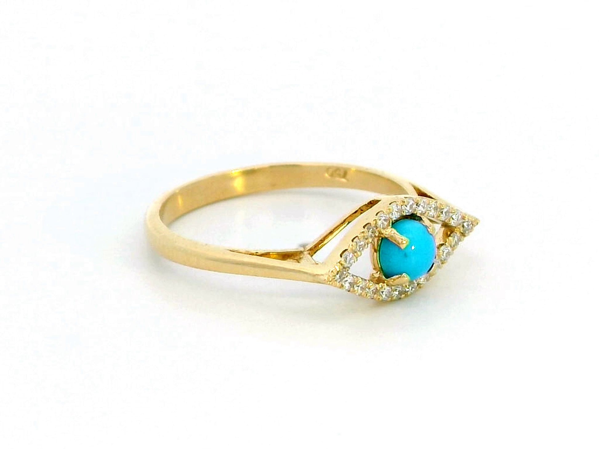 18K gold Evil Eye ring featuring a 0.32-carat turquoise center stone with a 0.15-carat diamond halo. Symbolic and stylish, perfect for stacking.