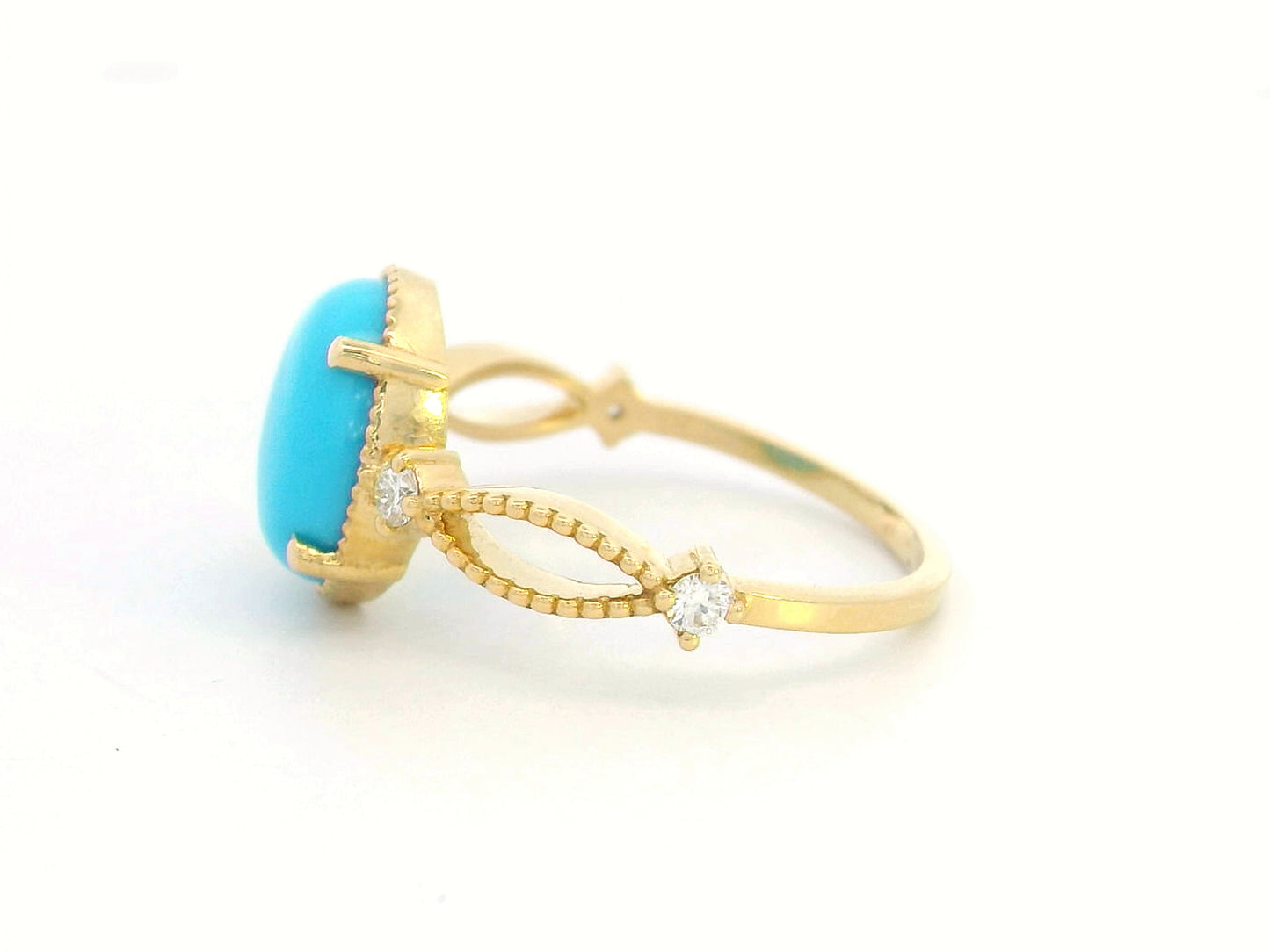 18K gold oval turquoise ring with diamond accents and vintage milgrain openwork design