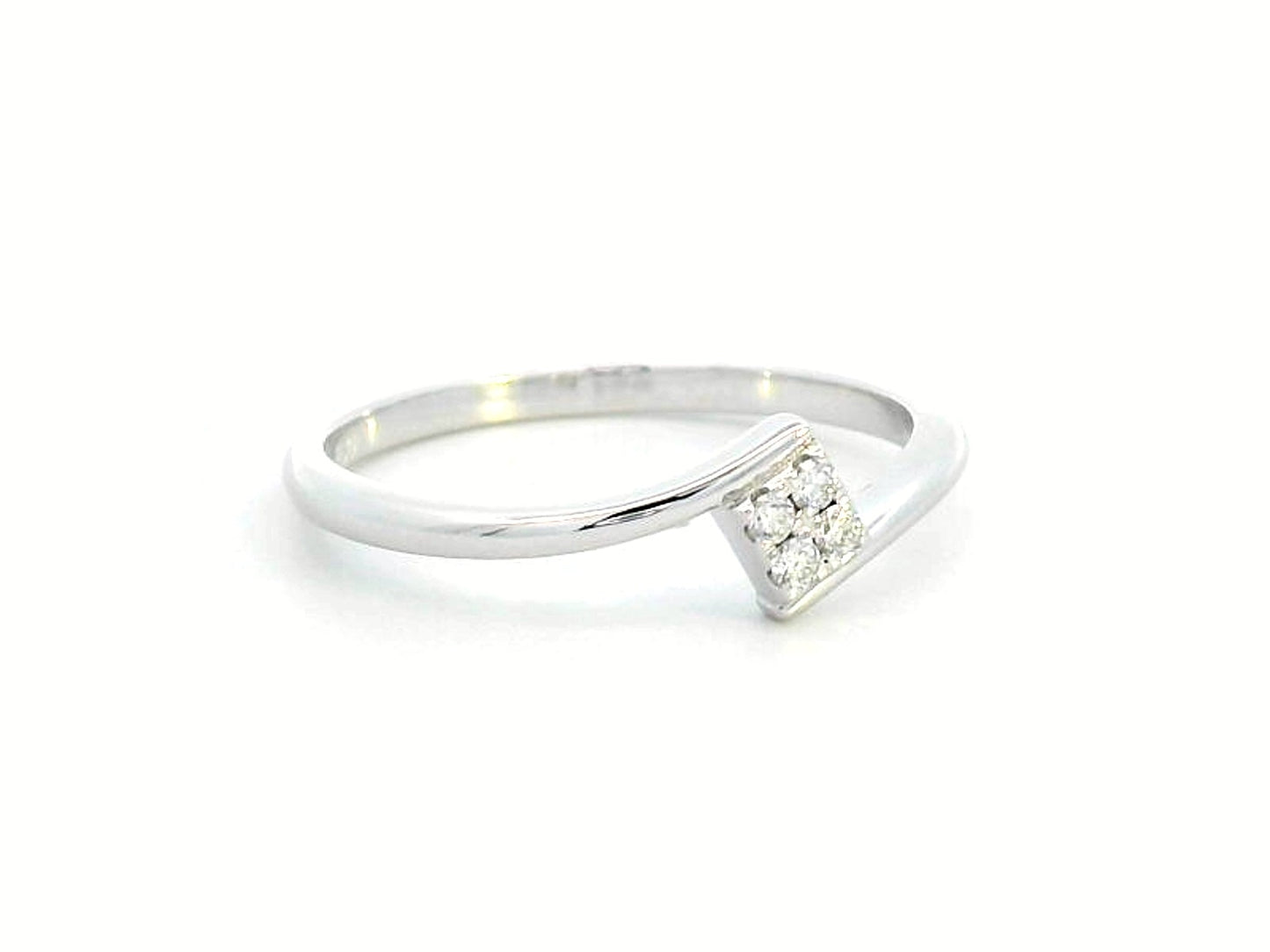 Minimalist 18K gold bypass ring with 0.06 carat total diamond weight, featuring a sleek modern design and geometric diamond setting.