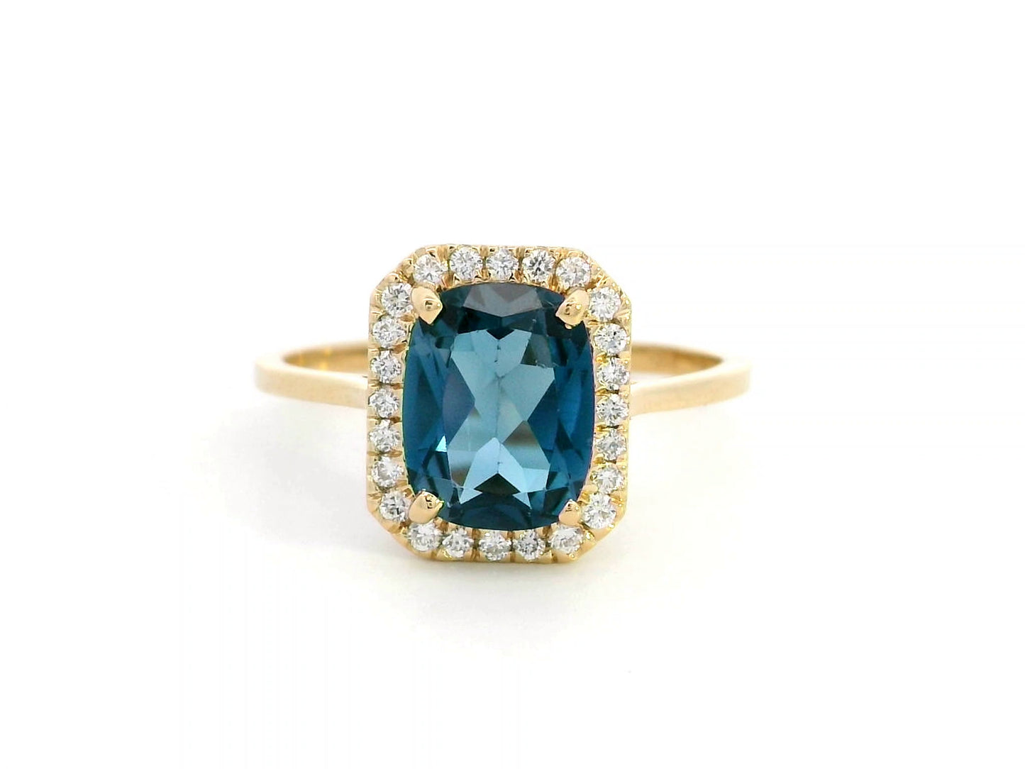 Emerald-cut 2.25-carat London Blue Topaz ring with 0.19-carat diamond accents in 18K yellow gold