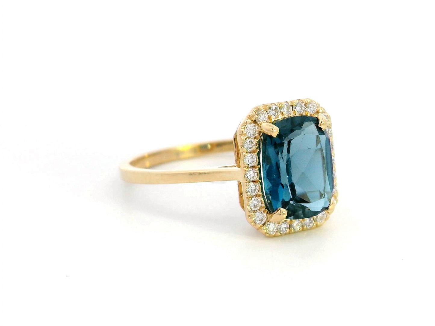 Emerald-cut 2.25-carat London Blue Topaz ring with 0.19-carat diamond accents in 18K yellow gold