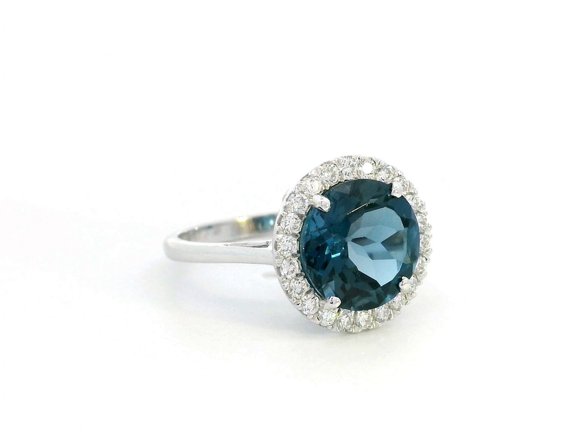 Elegant London Blue Topaz & Diamond Halo Ring in 18K White Gold – 4.33 Carat
