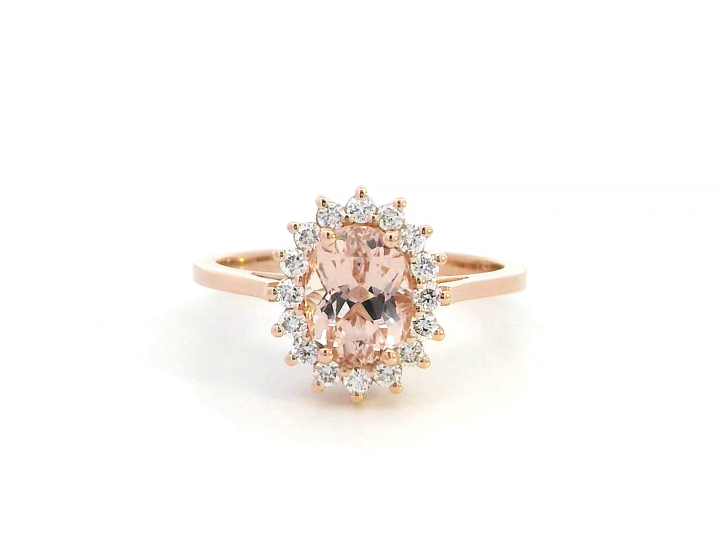 18K rose gold oval morganite ring with floral diamond halo, featuring a 1.57ct morganite and 0.29ct diamonds,