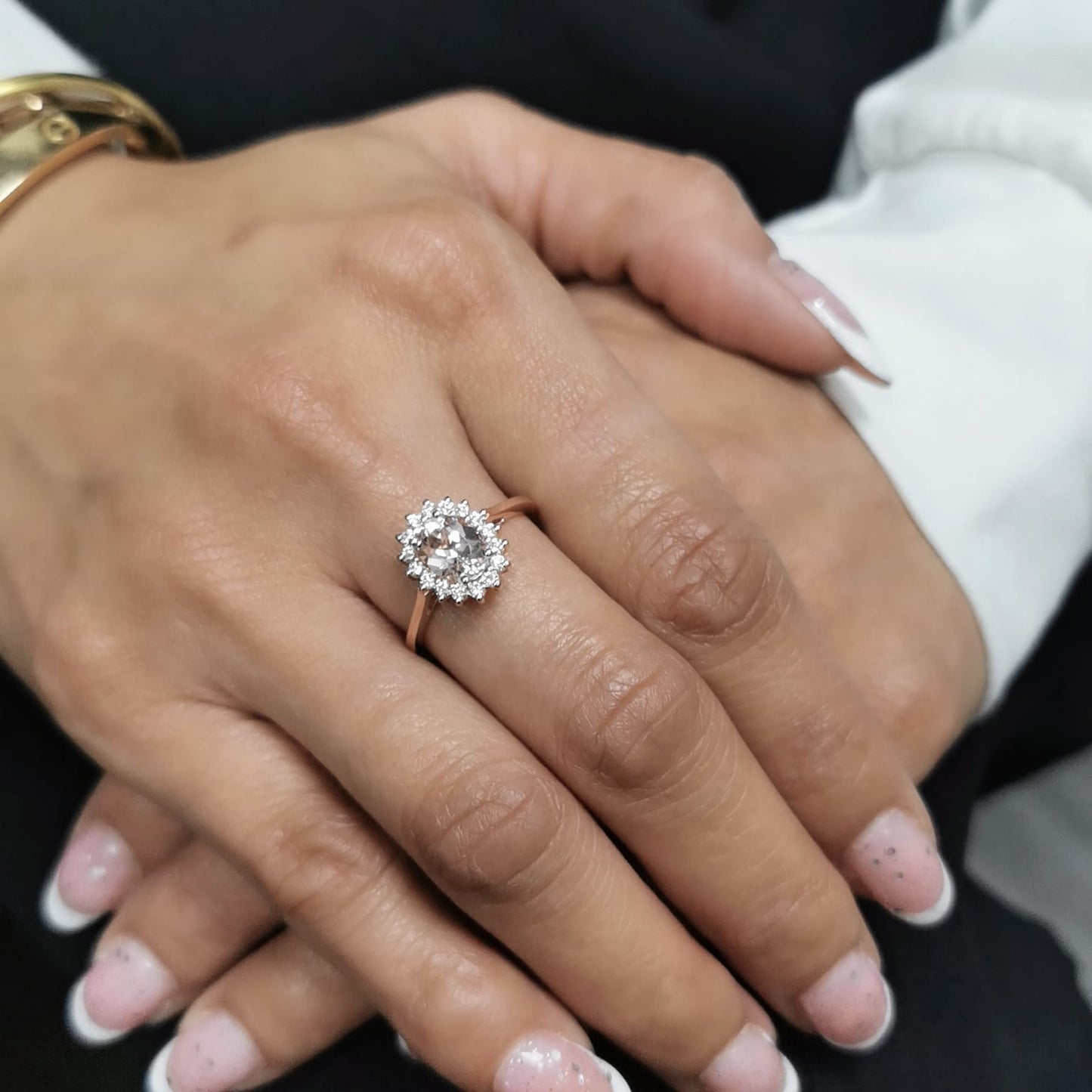 18K rose gold oval morganite ring with floral diamond halo, featuring a 1.57ct morganite and 0.29ct diamonds,