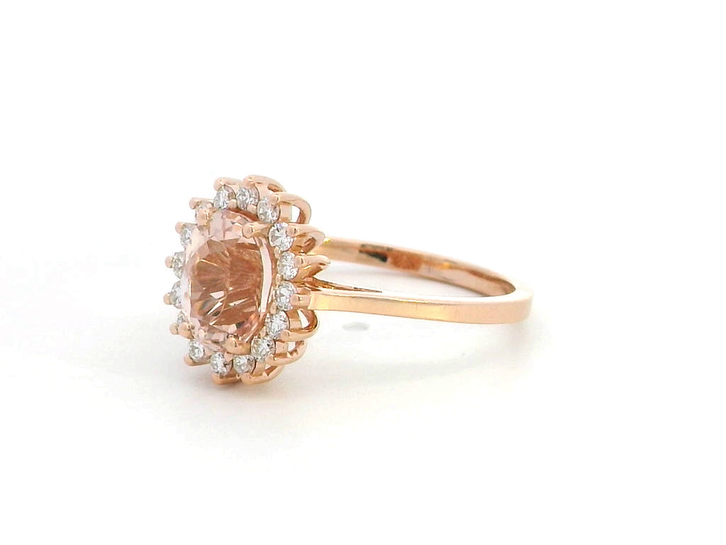 18K rose gold oval morganite ring with floral diamond halo, featuring a 1.57ct morganite and 0.29ct diamonds,