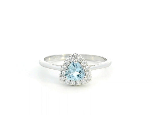 Trillion-cut aquamarine and diamond halo ring in 18K white gold, featuring a 0.50-carat aquamarine center stone surrounded by 0.15-carat diamonds.
