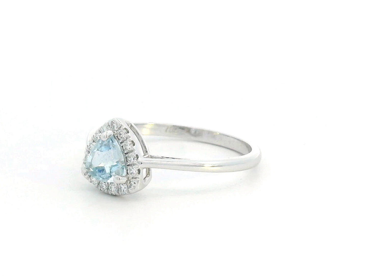 Trillion-cut aquamarine and diamond halo ring in 18K white gold, featuring a 0.50-carat aquamarine center stone surrounded by 0.15-carat diamonds.