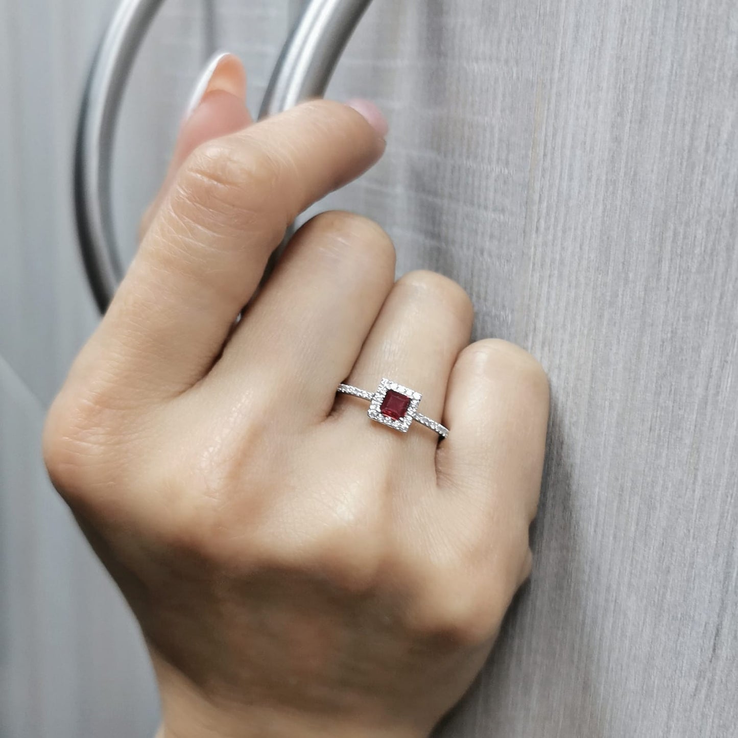 18K white gold ruby halo ring with diamonds – 0.30ct square-cut ruby, 0.24ct diamond pavé band, elegant fine jewelry