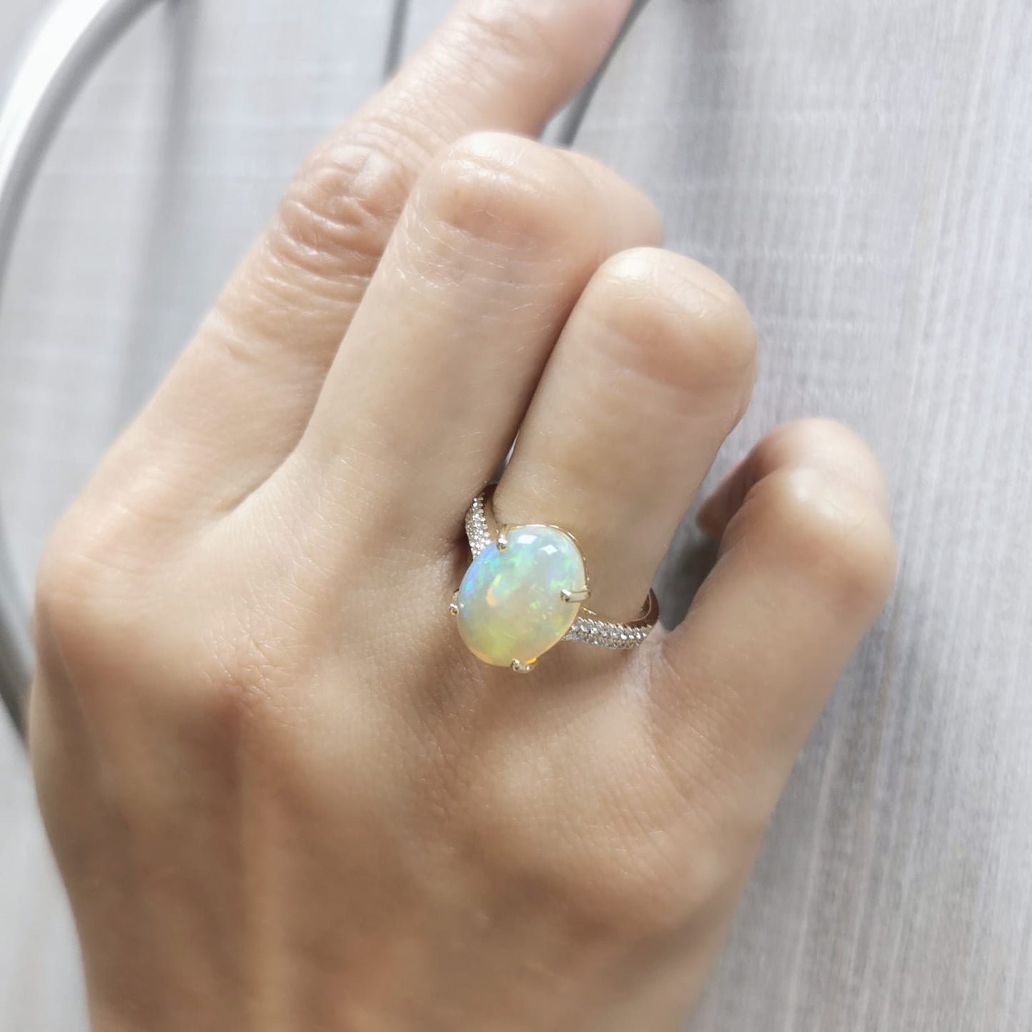 18K gold opal cocktail ring with diamonds – 3.65ct oval opal, 0.26ct pavé diamonds, elegant statement jewelry.