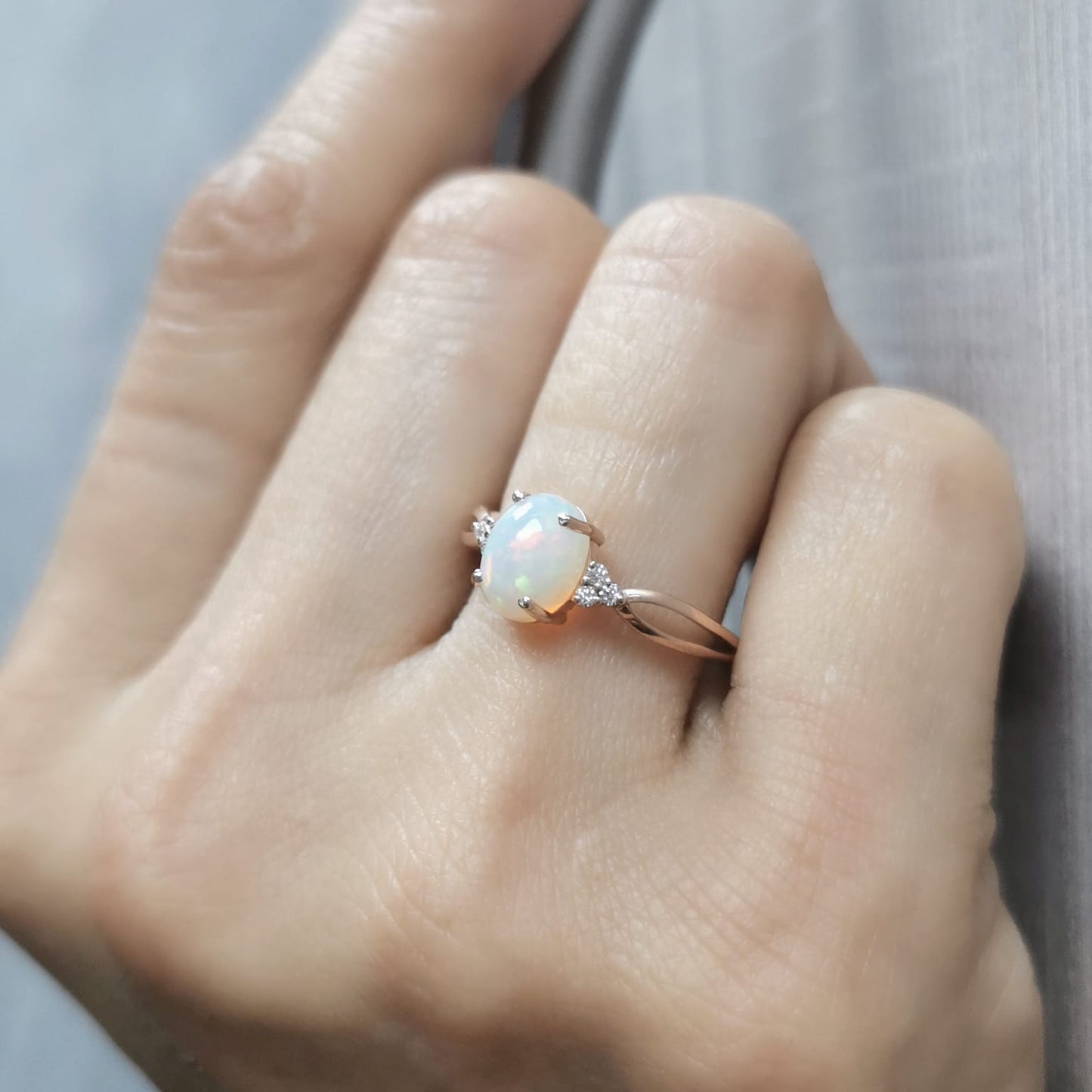 Elegant 18K gold Opal and diamond ring, 1.11-carat Opal with 0.06-carat diamond accents, October birthstone jewelry.