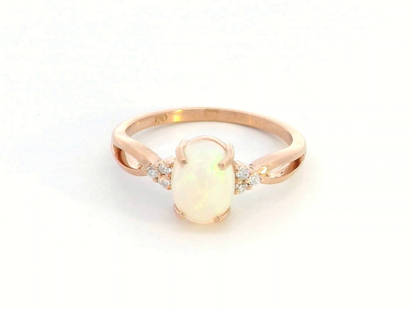 Elegant 18K gold Opal and diamond ring, 1.11-carat Opal with 0.06-carat diamond accents, October birthstone jewelry.