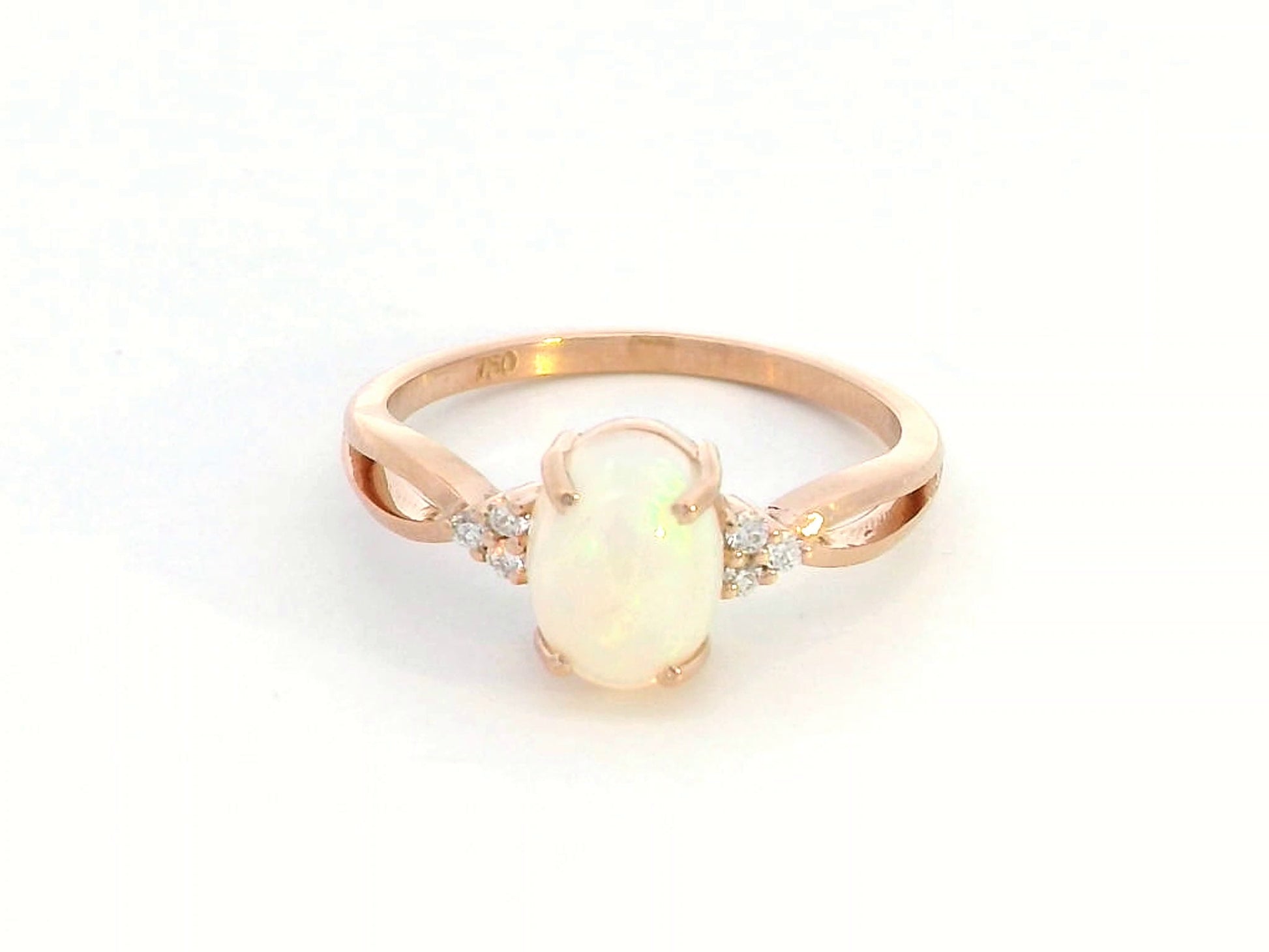 Elegant 18K gold Opal and diamond ring, 1.11-carat Opal with 0.06-carat diamond accents, October birthstone jewelry.
