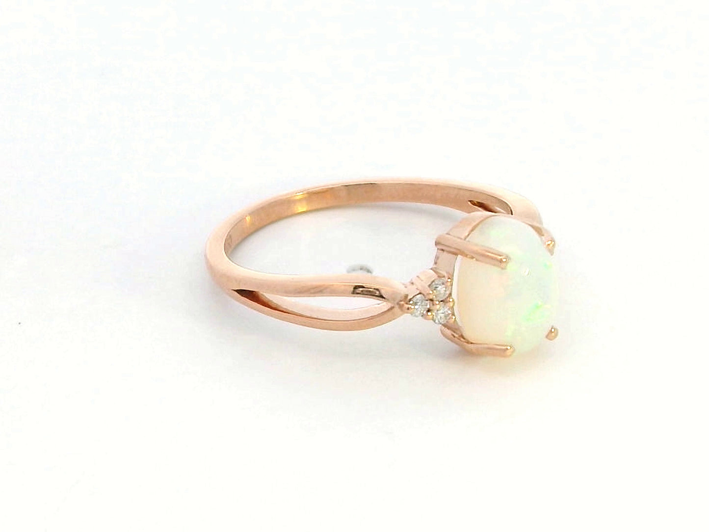 Elegant 18K gold Opal and diamond ring, 1.11-carat Opal with 0.06-carat diamond accents, October birthstone jewelry.