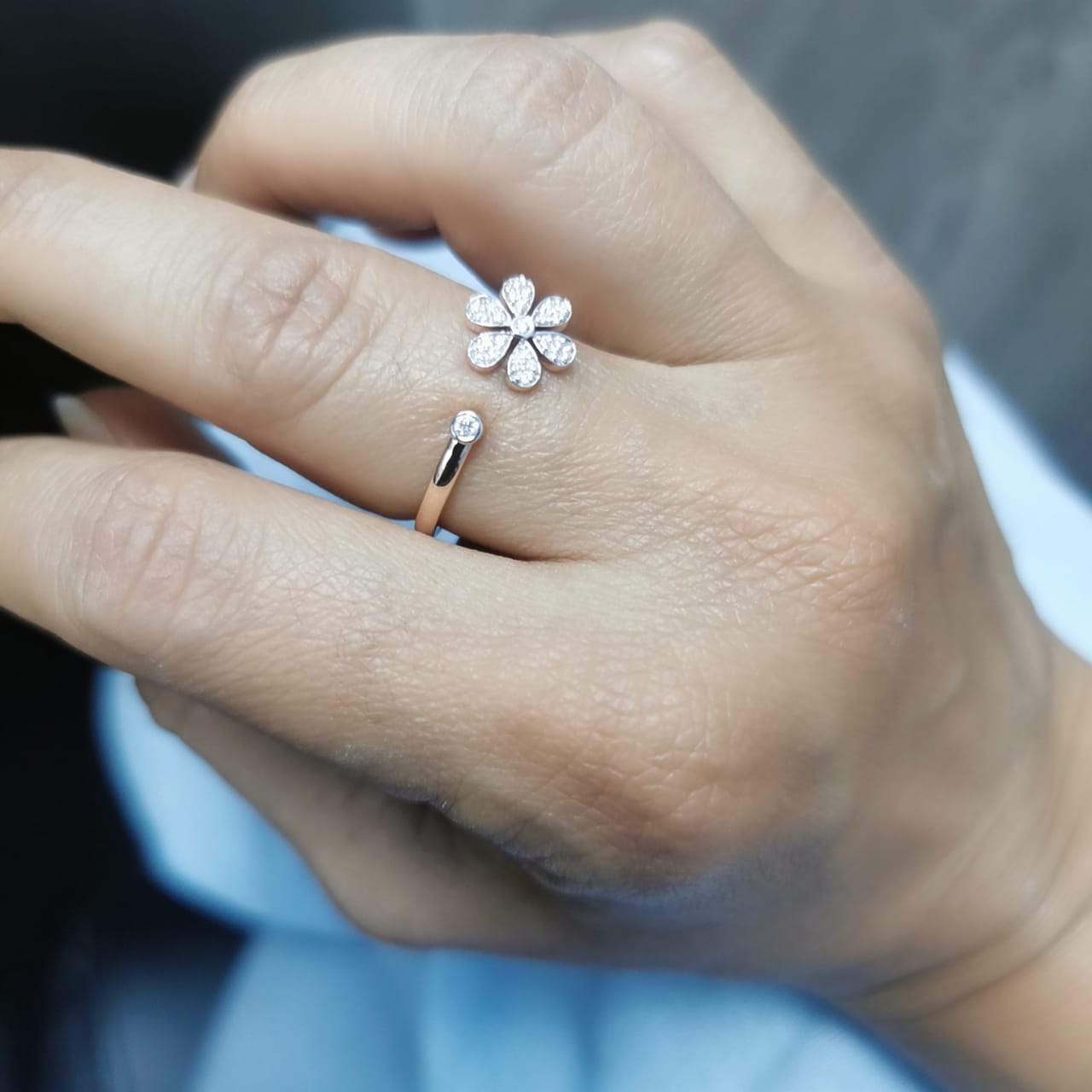 18K rose gold floral open ring with diamond-studded flower and bezel-set diamond – elegant fine jewelry