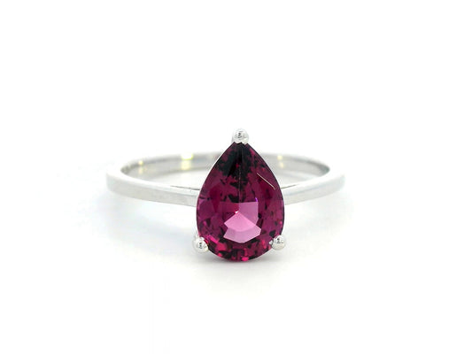 18K white gold pear-shaped Rhodolite ring with a smooth polished band, featuring a minimalist and timeless design.