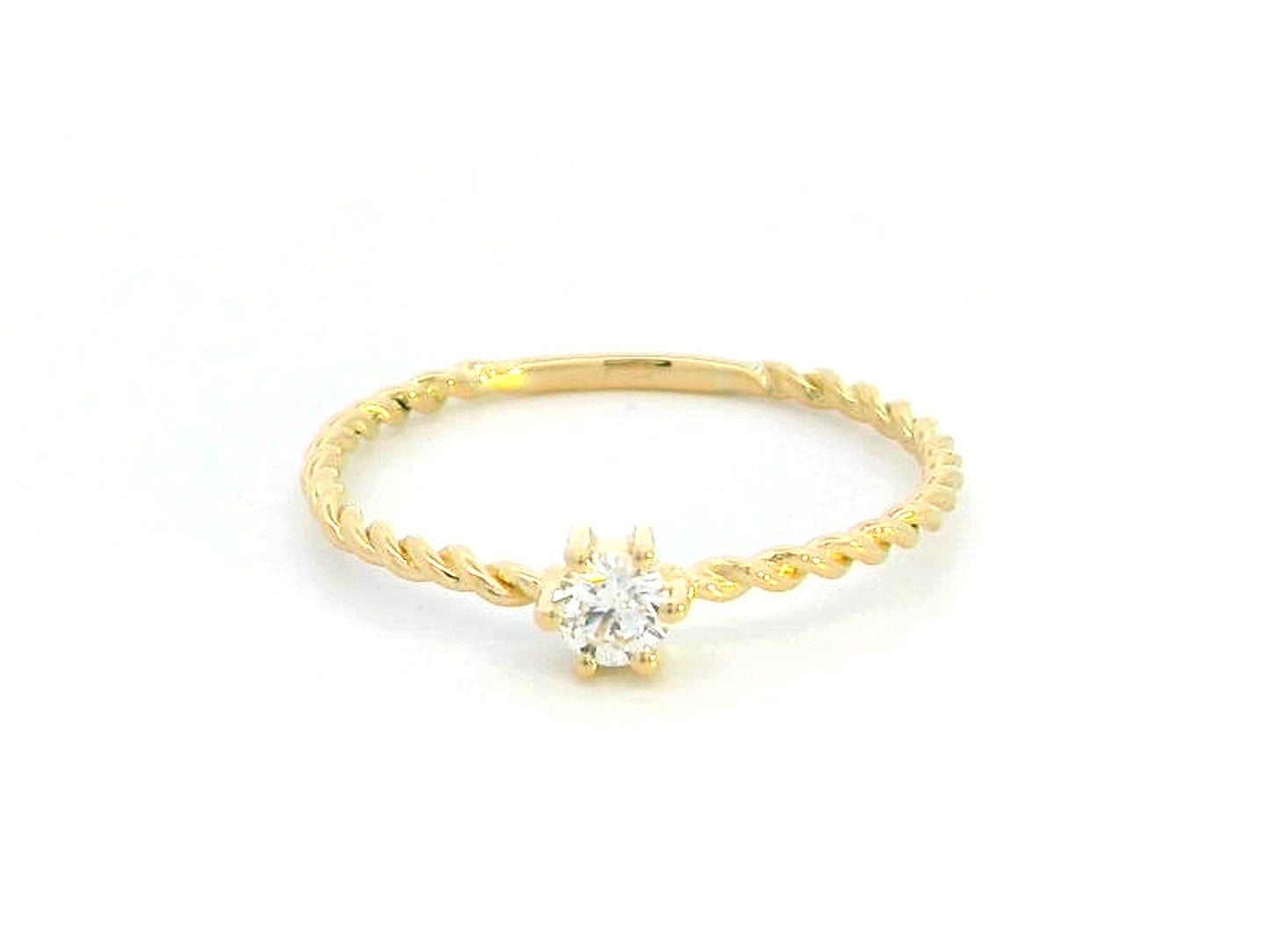 18K yellow gold twisted band diamond ring featuring a 0.15-carat round solitaire diamond in a delicate rope-style design