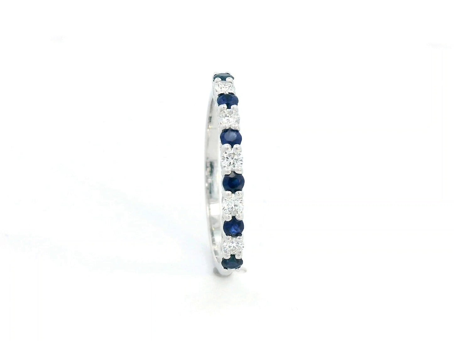18K white gold half eternity ring with alternating 0.28 CT blue sapphires and 0.18 CT diamonds, perfect as a wedding or stacking ring.