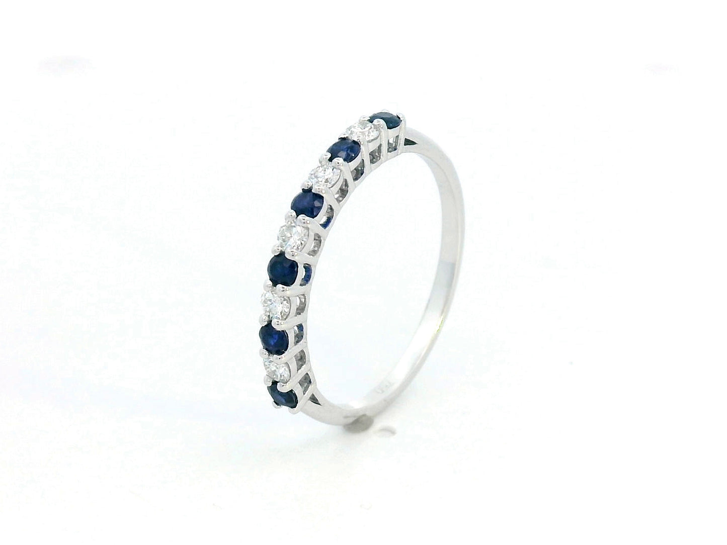 18K white gold band ring with alternating blue sapphires and diamonds, total sapphire weight 0.28 carat and total diamond weight 0.18 carat – Emirates Diamonds