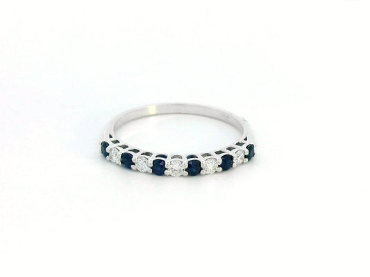 18K white gold half eternity ring with alternating 0.28 CT blue sapphires and 0.18 CT diamonds, perfect as a wedding or stacking ring.