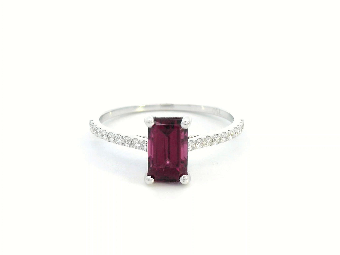 18K white gold ring featuring a 1.46-carat emerald-cut Rhodolite with 0.18 carats of diamonds on the band.