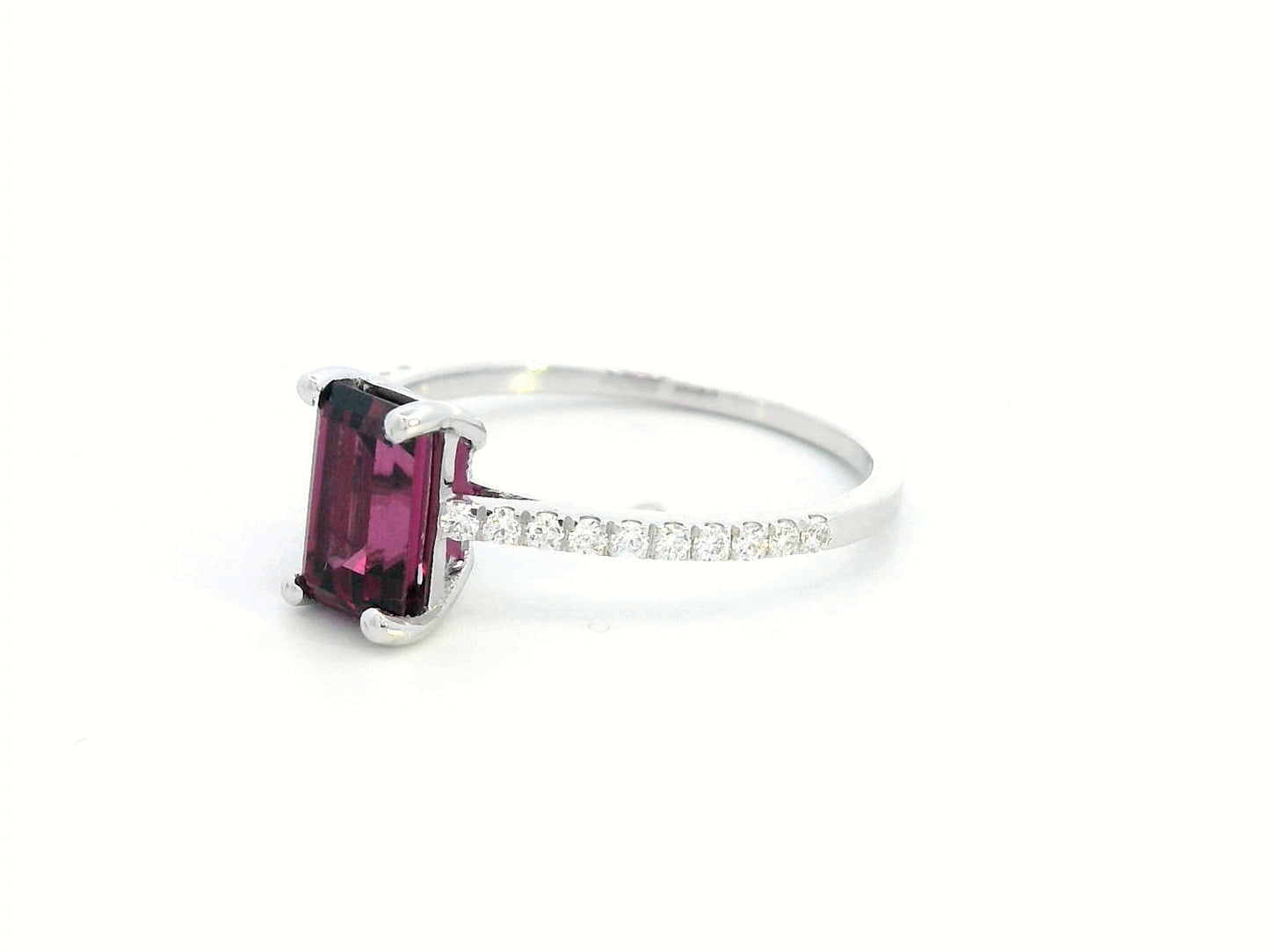 18K white gold ring featuring a 1.46-carat emerald-cut Rhodolite with 0.18 carats of diamonds on the band.