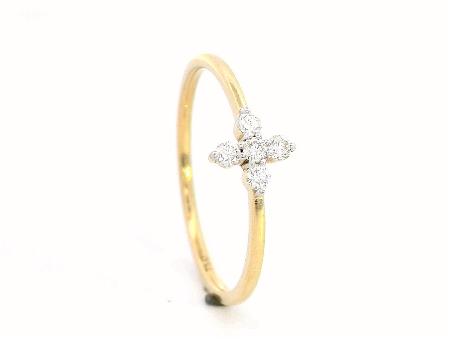 Minimalist 18K gold diamond cluster ring featuring a dainty 0.13ct floral-inspired design, perfect for stacking or daily wear.