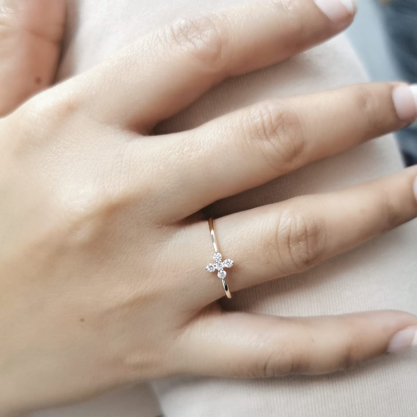 Minimalist 18K gold diamond cluster ring featuring a dainty 0.13ct floral-inspired design, perfect for stacking or daily wear.
